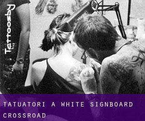 Tatuatori a White Signboard Crossroad